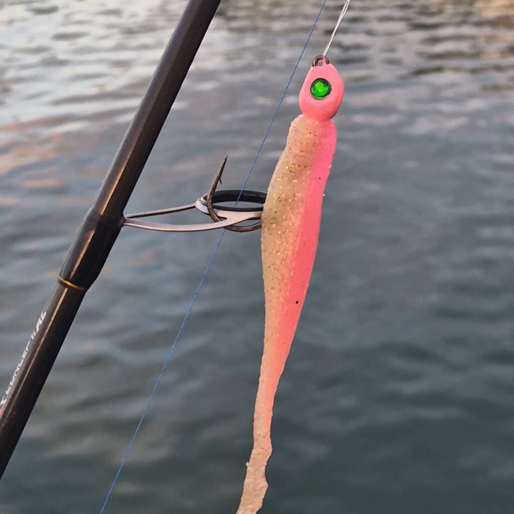 The Ninth Nebula Pink Glow Jig Head paired with a ZMan Laguna Shrimp softbait.